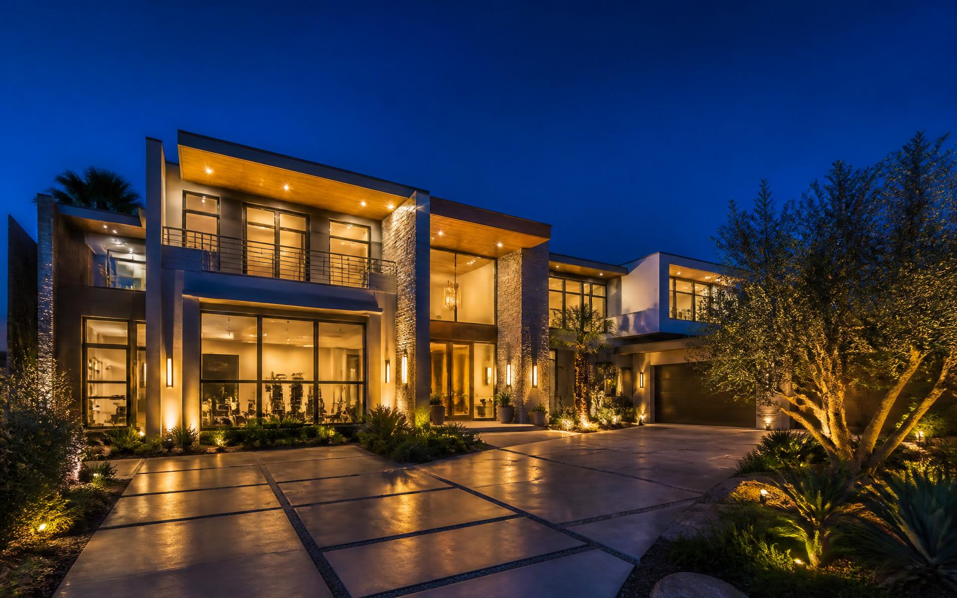 Modern luxury home photographed at dusk